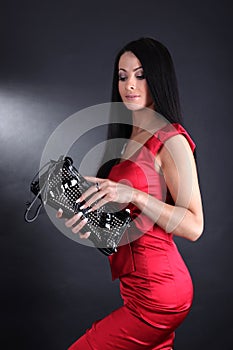 Woman with clutch bag photo