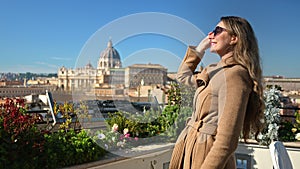 Woman in a coat looking at the panoramic