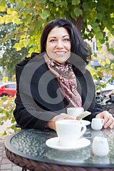 Woman and coffee in autumn