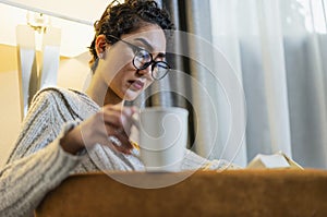 Woman with Coffee and Book