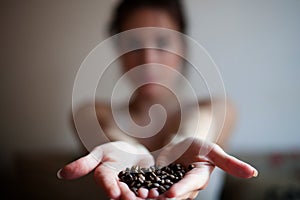 Woman with Coffee cup on ceramic table and mobile phone