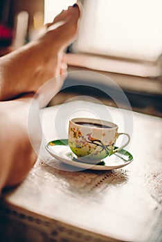 Woman and Coffee at home for breackfast