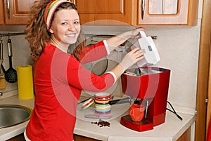 Woman with coffee machine