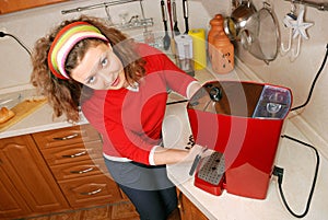 Woman with coffee machine