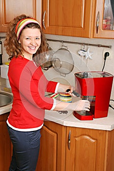 Woman with coffee machine