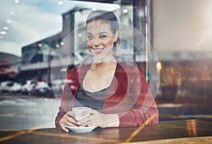 Woman, coffee shop and portrait with window and latte with happy customer and smile by table. Cup, restaurant and