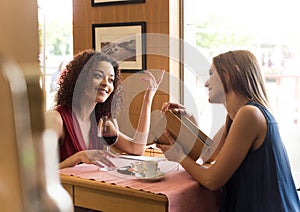 Woman at coffee shop table