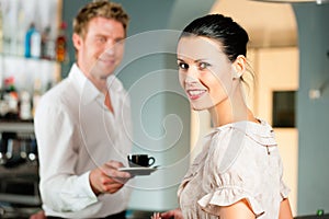 Woman in a coffeeshop photo