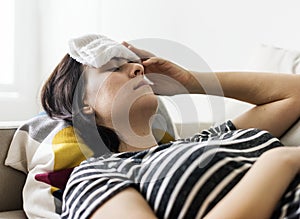 Woman with a cold and high fever