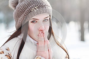 Woman in cold sunny winter