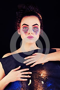 Woman with Colorful Makeup. Fashion Model with Creative Makeup