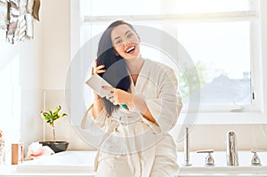 Woman is combing hair