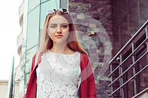 Woman coming outside of the office happy. Half length body woman girl looking at you camera smile on face white shirt red blouse,