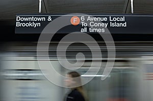 Woman Commuting NYC Subway MTA Train Arriving Station