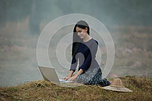 Woman computer on the countryside