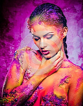 Woman with conceptual colourful body art