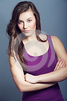 Woman, confidence and makeup in studio portrait, cosmetics and beauty on gray background. Female person, attitude and