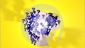 Woman with confused thoughts in studio with yellow background and blue question marks