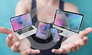 Woman connecting modern smartphone tablet laptop and computer 3D rendering