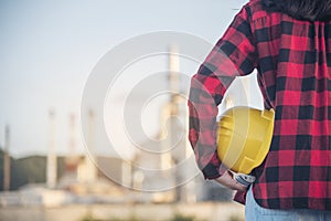 Woman construction engineer wear safety white hard hat at construction site industry worker. Female engineer worker civil