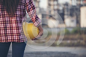 Woman construction engineer wear safety white hard hat at construction site industry worker. Female engineer worker civil