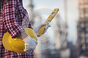 Woman construction engineer wear safety white hard hat at construction site industry worker. Female engineer worker civil