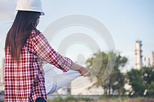 Woman construction engineer wear safety white hard hat at construction site industry worker. Female engineer worker civil