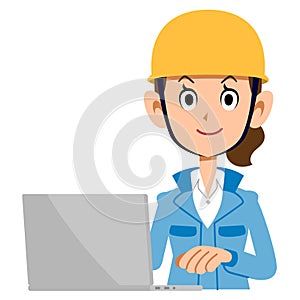 A woman in the construction industry who operates a personal computer blue clothes