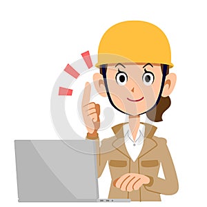 A woman in the construction industry who operates a personal computer while explaining the main points, .Beige clothes