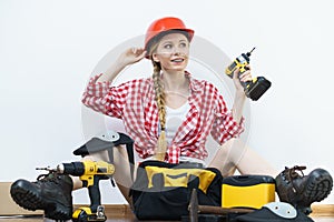 Woman constructive worker with tool bag