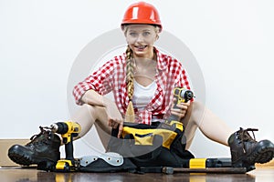 Woman constructive worker with tool bag