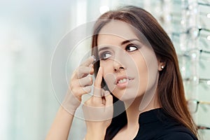 Woman with Contact Lenses Case in Optical Store