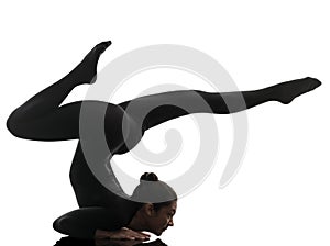 Woman contortionist exercising gymnastic yoga silhouette