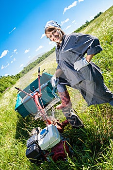 Woman controls the tiller