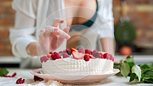 Woman coocking birthday cake