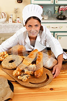 Woman cook with baked goods