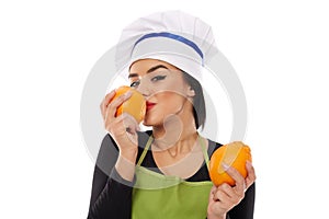 Woman cook with perfumed oranges