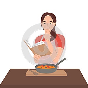 Woman cook reading recipes and cooking soup