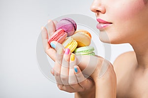 Woman with cookies makarons