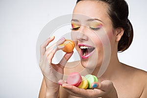 Woman with cookies makarons