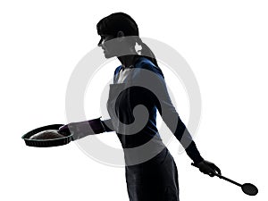 Woman cooking cake pastry silhouette