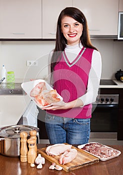 Woman cooking jellied meat with offals