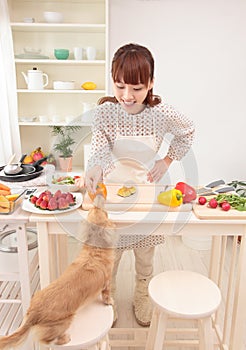 Woman cooking in kitchen