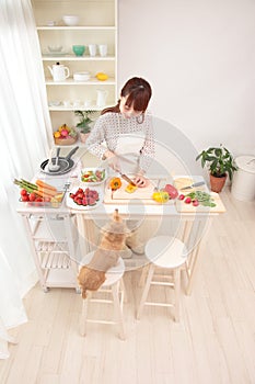 Woman cooking in kitchen