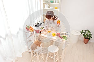 Woman cooking in kitchen