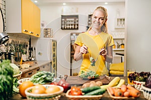 Woman cooking on the kitchen, eco food preparation