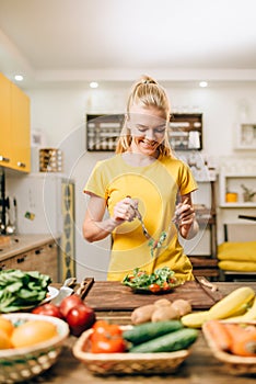 Woman cooking on the kitchen, eco food preparation