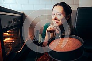 Woman Cooking Using a Toothpick Checking on her Baked Cake