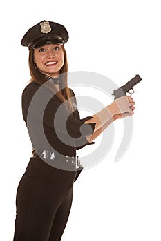 Woman cop hold pistol yikes photo