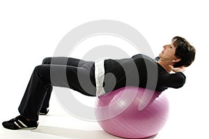 Woman core training fitness ball sit ups